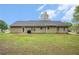Spacious backyard featuring a lush green lawn, ideal for outdoor gatherings and recreation at 60 Cypress Dr, Covington, GA 30016