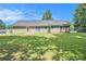 Large fenced backyard with a well-maintained lawn at 60 Cypress Dr, Covington, GA 30016