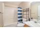 Bathroom with shower and tub combination, vanity, and decorative shelving at 60 Cypress Dr, Covington, GA 30016