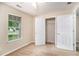 Cozy bedroom features carpeted floors, a closet, and lots of natural light at 60 Cypress Dr, Covington, GA 30016