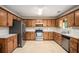 Well-equipped kitchen featuring stainless steel appliances and ample counter space at 60 Cypress Dr, Covington, GA 30016