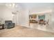 Open floor plan with living and dining areas features neutral walls and ceiling fan at 60 Cypress Dr, Covington, GA 30016