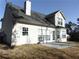Exterior backyard view of the home and stone patio at 1662 Maple Trace Ct, Grayson, GA 30017