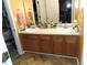Bathroom vanity with double sinks, offering plenty of counter space and storage at 1662 Maple Trace Ct, Grayson, GA 30017