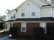 Charming two-story home featuring a combination of red brick and light siding at 1662 Maple Trace Ct, Grayson, GA 30017