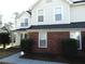 Charming two-story home featuring a combination of red brick and light siding at 1662 Maple Trace Ct, Grayson, GA 30017