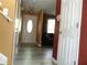 Welcoming entry hallway with luxury vinyl plank flooring and neutral paint tones leading to the main living area at 1662 Maple Trace Ct, Grayson, GA 30017