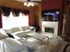 Bright and inviting living room featuring a fireplace and modern decor at 1662 Maple Trace Ct, Grayson, GA 30017