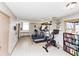 Community gym with treadmills, stationary bikes, weight equipment, and reading materials at 2285 Peachtree Rd Ne # 803, Atlanta, GA 30309