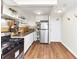 Efficient kitchen featuring stainless steel appliances and bright white cabinetry at 2285 Peachtree Rd Ne # 803, Atlanta, GA 30309