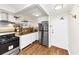 Bright kitchen featuring stainless steel appliances and updated white cabinetry at 2285 Peachtree Rd Ne # 803, Atlanta, GA 30309