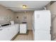 Community laundry room with multiple washers and dryers for convenient resident use at 2285 Peachtree Rd Ne # 803, Atlanta, GA 30309