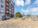 Spacious outdoor patio with grills, seating, and dining areas perfect for entertaining at 2285 Peachtree Rd Ne # 803, Atlanta, GA 30309