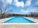 Community swimming pool with lounge chairs and manicured landscaping at 2285 Peachtree Rd Ne # 803, Atlanta, GA 30309