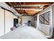 Basement area with exposed ductwork and a window overlooking the outdoors at 2664 Stonebrook Ne Ct, Roswell, GA 30075