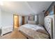 Bedroom featuring neutral walls, carpeting, and window with patterned curtains at 2664 Stonebrook Ne Ct, Roswell, GA 30075