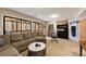 Cozy living room with large sliding doors leading to a deck with outdoor seating at 2664 Stonebrook Ne Ct, Roswell, GA 30075