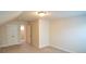 Bedroom featuring window, closet with double doors, neutral walls, ceiling light, and carpet at 3182 Hartford Mill Pl, Duluth, GA 30097