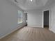 A calming main bedroom features carpet, natural light, and an en suite bathroom at 45 Hampton Dr, Cartersville, GA 30121