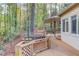 Multi-level back deck with stairs leading to peaceful backyard setting at 1667 Manhasset Farm Ct, Atlanta, GA 30338