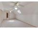 Bright and spacious carpeted room featuring a skylight at 1667 Manhasset Farm Ct, Atlanta, GA 30338