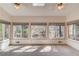Bright sunroom with large windows and skylights providing abundant natural light at 1667 Manhasset Farm Ct, Atlanta, GA 30338