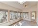 Bright sunroom with large windows and skylights providing abundant natural light at 1667 Manhasset Farm Ct, Atlanta, GA 30338