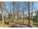 View from the backyard showcases mature trees and landscaped surroundings at 407 North Ave, Atlanta, GA 30354