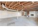 Unfinished basement with exposed ceiling and support beams at 407 North Ave, Atlanta, GA 30354