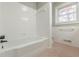 Bathroom with tile and a window for natural light at 407 North Ave, Atlanta, GA 30354