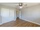 Bright bedroom features hardwood floors, neutral walls, and a ceiling fan at 407 North Ave, Atlanta, GA 30354