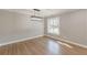 Open dining room with hardwood floors and modern light fixture at 407 North Ave, Atlanta, GA 30354
