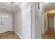 Hallway leading to other rooms with hardwood floors and neutral paint at 407 North Ave, Atlanta, GA 30354