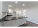 Kitchen area with modern appliances and dark countertops at 407 North Ave, Atlanta, GA 30354