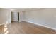 Open living area with hardwood floors, neutral walls, and white trim at 407 North Ave, Atlanta, GA 30354