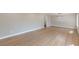 Spacious living area with hardwood floors and modern lighting at 407 North Ave, Atlanta, GA 30354