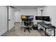 Finished basement featuring a comfortable work area and workout equipment on the durable modern flooring at 4087 Signal Rdg, Lilburn, GA 30047