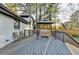 Large deck with pergola, grill and seating area perfect for outdoor entertaining at 4087 Signal Rdg, Lilburn, GA 30047