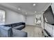 Cozy living room with a large window, and stairs leading to the upper level at 4087 Signal Rdg, Lilburn, GA 30047