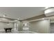 Finished basement featuring a recreation area, bar, and stairs leading to the upper level at 1698 Little Fox Ln, Dacula, GA 30019