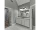 Bright bathroom with tiled floors and double doors at 1698 Little Fox Ln, Dacula, GA 30019