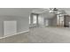 Spacious bonus room with plush carpeting and dormer windows at 1698 Little Fox Ln, Dacula, GA 30019