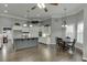 Open floor plan featuring a kitchen island, a dining area and modern, upscale design at 1698 Little Fox Ln, Dacula, GA 30019