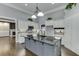 Spacious kitchen featuring a large island with a sink, ample storage, and stainless steel appliances at 1698 Little Fox Ln, Dacula, GA 30019