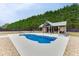 Charming pool and gazebo area with ample space for lounging, entertaining, and enjoying the outdoors at 1698 Little Fox Ln, Dacula, GA 30019