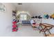 Spacious carpeted bedroom featuring a pitched ceiling and natural light at 5581 Stapleton Dr, Dunwoody, GA 30338