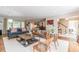 Open concept living room with hardwood floors and modern decor with easy access to other rooms at 5581 Stapleton Dr, Dunwoody, GA 30338