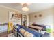 Stylish living room with a cozy sofa, eclectic artwork, and a bright, airy feel with connecting rooms at 5581 Stapleton Dr, Dunwoody, GA 30338