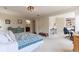 Spacious main bedroom with attached office space and ensuite bathroom at 5581 Stapleton Dr, Dunwoody, GA 30338