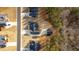 Aerial view of neighborhood showing home, detached garage and wooded boundary at 598 Barnwood Dr, Rockmart, GA 30153
